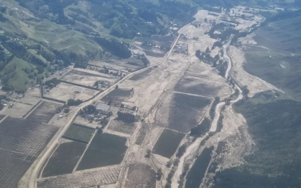 The aftermath of massive flooding that swept through the Esk Valley during Cyclone Gabrielle. The river's normal path can be seen running down the right of the valley.