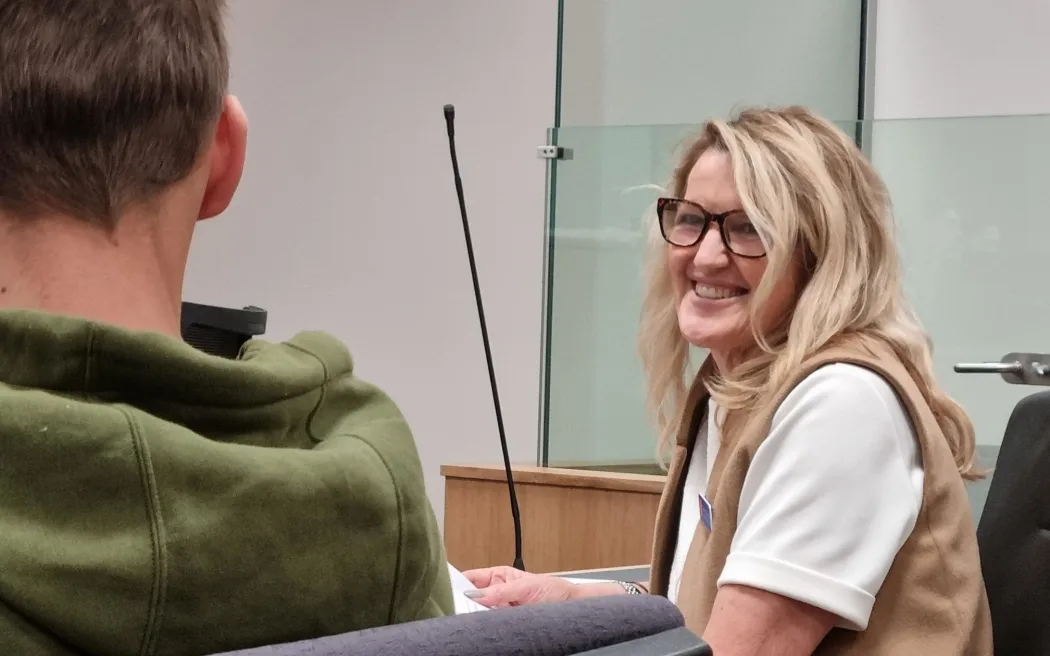 The Court of New Beginnings coordinator Carmel Claridge with Tim as he graduates.