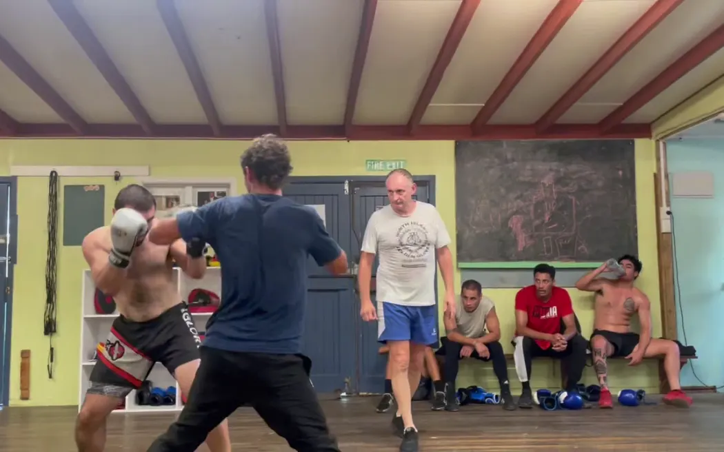 Jamie Cox (right) of Wairoa Boxing club reffing a sparring session